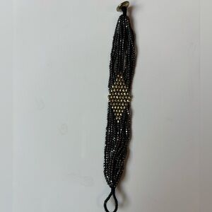 Jet and gold beaded bracelet